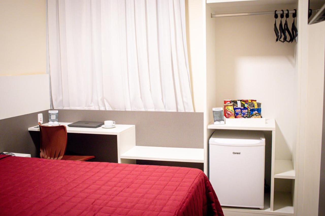 Hotel H2 Congonhas Congonhas  Exterior foto A typical room at a capsule hotel