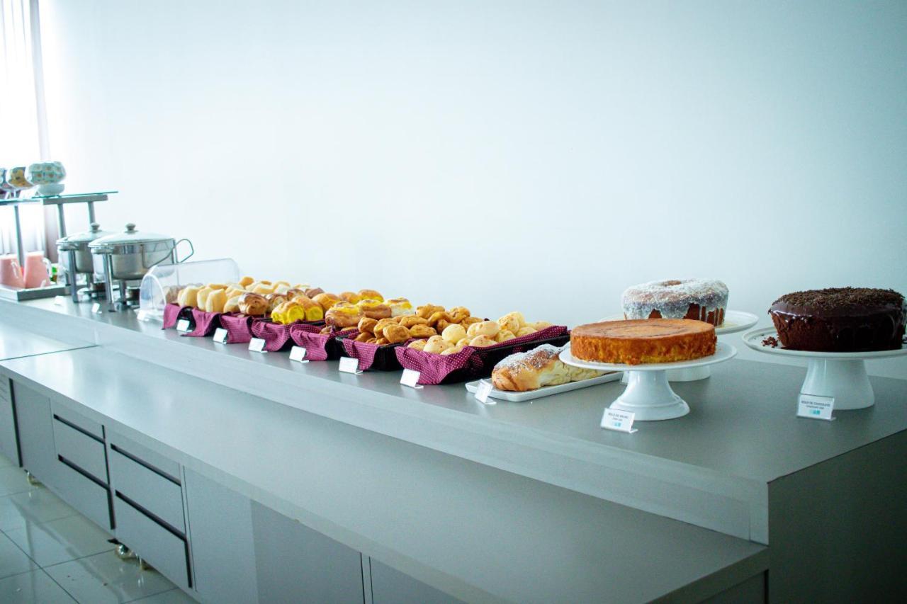 Hotel H2 Congonhas Congonhas  Exterior foto A selection of cakes